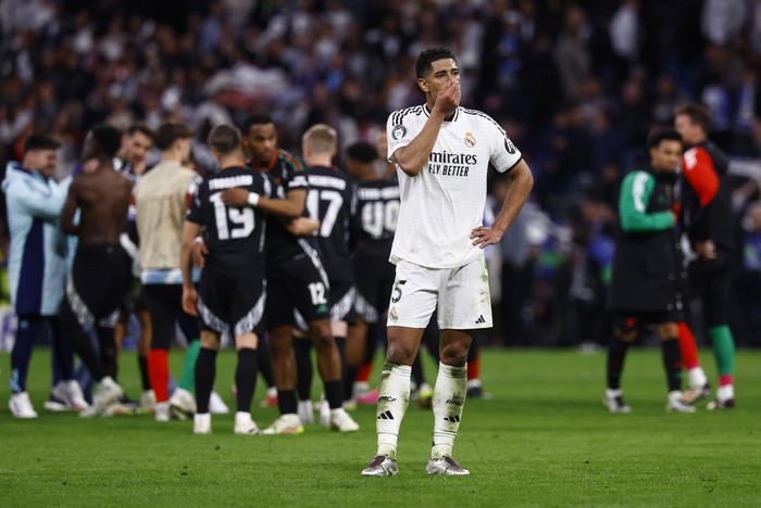 Soccer Football - Champions League - Quarter Final - Second Leg - Real Madrid v Arsenal - Santiago Bernabeu, Madrid, Spain - April 16, 2025 Real Madrids Jude Bellingham looks dejected after the match REUTERS/Susana Vera