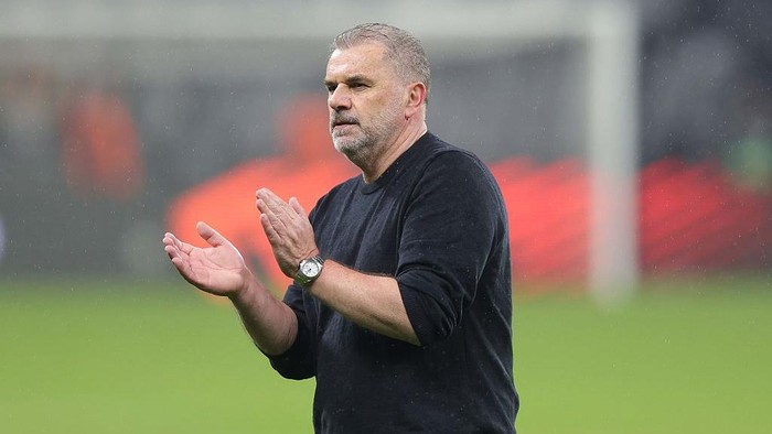 FRANKFURT AM MAIN, GERMANY - APRIL 17: Ange Postecoglou, manager of Tottenham Hotspur, applauds his players after the victory at the full time whistle during the UEFA Europa League 2024/25 Quarter Final Second Leg match between Eintracht Frankfurt and Tottenham Hotspur at Deutsche Bank Park on April 17, 2025 in Frankfurt am Main, Germany. (Photo by Crystal Pix/MB Media/Getty Images)
