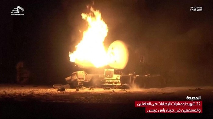 EDITORS NOTE: Graphic content / This grab taken from footage released by al-Masirah TV station of Yemens Huthis shows fire and destruction at the site of US strikes on the Ras Issa fuel port in western Yemen on April 18, 2025. Yemens Huthi rebels said US strikes on a fuel port killed 58 people and wounded more than 100 on April 18, making it the deadliest attack of Washingtons intensified month-long air campaign. (Photo by AL-MASIRAH TV / AFP) / RESTRICTED TO EDITORIAL USE - MANDATORY CREDIT AFP PHOTO / HANDOUT / AL-MASIRAH TV  - NO MARKETING NO ADVERTISING CAMPAIGNS - DISTRIBUTED AS A SERVICE TO CLIENTS