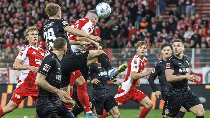 Berlins Andrej Ilic scores during the Bundesliga soccer match between 1. FC Union Berlin and VfB Stuttgart in Berlin, Saturday April 19, 2025. (Andreas Gora/dpa via AP)