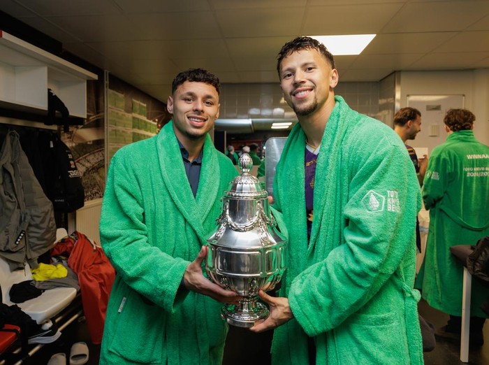 ROTTERDAM, NETHERLANDS - APRIL 21: (L-R)  Dean James of Go Ahead Eagles, Luca Everink of Go Ahead Eagles celebrating the victory with the trophy  during the Dutch KNVB Beker  match between AZ Alkmaar v Go Ahead Eagles at the De Kuip on April 21, 2025 in Rotterdam Netherlands (Photo by Rico Brouwer/Soccrates/Getty Images)