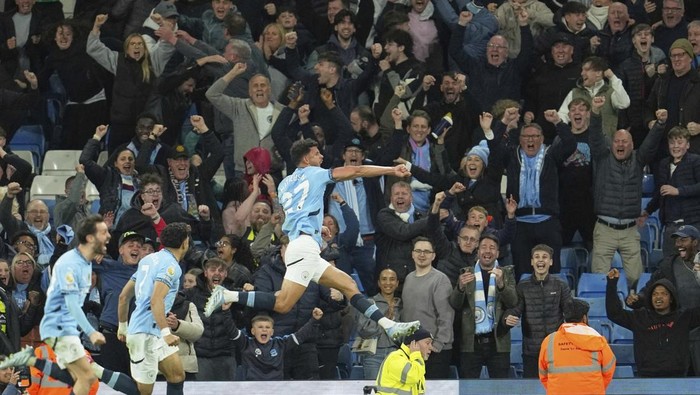Manchester City Manchester Citys Matheus Nunes celebrates after scoring his sides second goal during the English Premier League soccer match between Manchester City and Aston Villa at Etihad stadium in Manchester, England, Tuesday, April 22, 2025. (AP Photo/Jon Super)