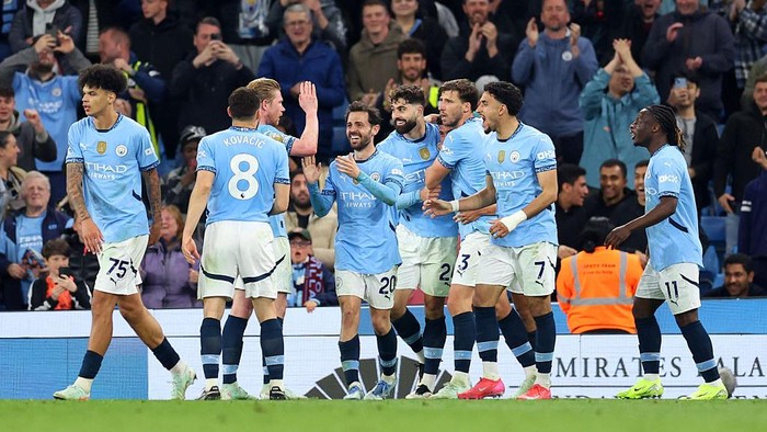 Manchester City MANCHESTER, ENGLAND - APRIL 22: Matheus Nunes of Manchester City celebrates with team mates after scoring his teams second goal during the Premier League match between Manchester City FC and Aston Villa FC at Etihad Stadium on April 22, 2025 in Manchester, England. (Photo by Molly Darlington/Copa/Getty Images)