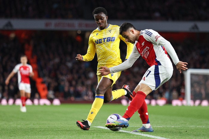 LONDON, ENGLAND - APRIL 23: Eddie Nketiah of Crystal Palace and Gabriel Martinelli of Arsenal during the Premier League match between Arsenal FC and Crystal Palace FC at Emirates Stadium on April 23, 2025 in London, England. (Photo by Catherine Ivill - AMA/Getty Images)