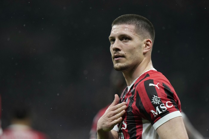 AC Milans Luka Jovic reatcs after scoring during the Italian Cup semifinal second leg soccer match between Inter Milan and AC Milan at the San Siro stadium in Milan, Italy, Wednesday, April 23, 2025. (AP Photo/Luca Bruno)