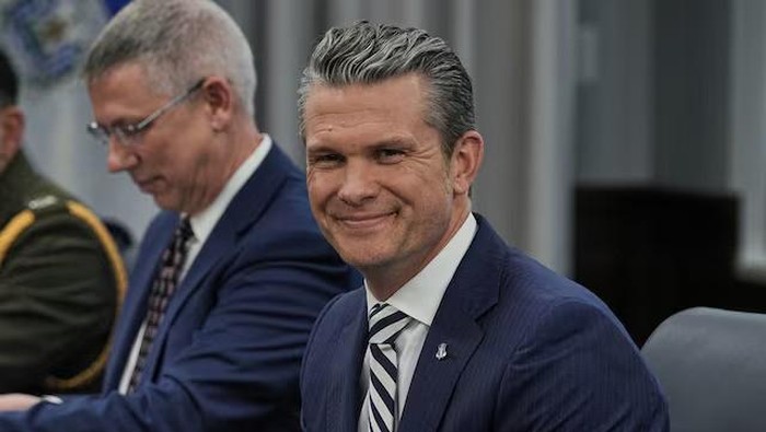 Menhan AS Pete Hegseth U.S. Defense Secretary Pete Hegseth reacts as he meets with El Salvador Defense Minister Rene Merino Monroy at the Pentagon in Washington, D.C., U.S., April 16, 2025. REUTERS/Ken Cedeno Purchase Licensing Rights