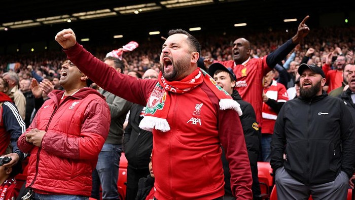 Liverpool LIVERPOOL, ENGLAND - APRIL 13: Liverpool fans celebrate during the Premier League match between Liverpool FC and West Ham United FC at Anfield on April 13, 2025 in Liverpool, England. (Photo by Justin Setterfield/Getty Images)