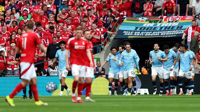 LONDON, ENGLAND - APRIL 27: Rico Lewis of Manchester City celebrates scoring his teams first goal with teammates during the Emirates FA Cup Semi Final match between Nottingham Forest and Manchester City at Wembley Stadium on April 27, 2025 in London, England. (Photo by Cameron Smith - The FA/The FA via Getty Images)