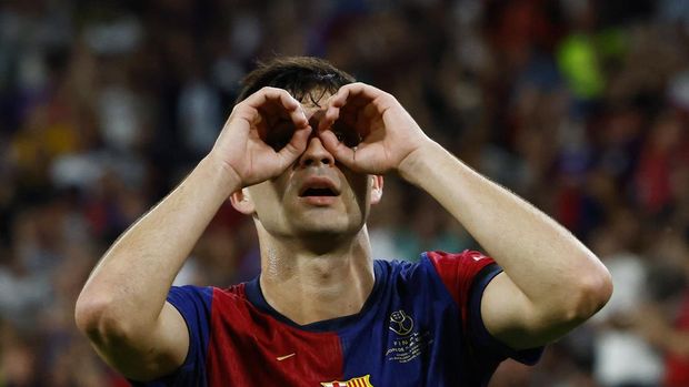Soccer Football - Copa del Rey - Final - FC Barcelona v Real Madrid - Estadio de La Cartuja, Seville, Spain - April 26, 2025 FC Barcelona's Pedri celebrates scoring their first goal REUTERS/Borja Suarez