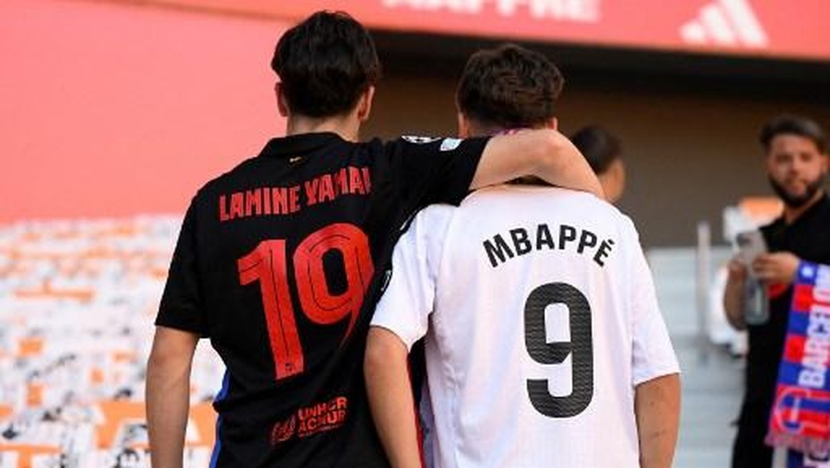 Lamine Yamal, Kylian Mbappe, disebut di antara tiga pemain terbaik di dunia saat ini bersama Rodri. (Foto: AFP/JOSEP LAGO)