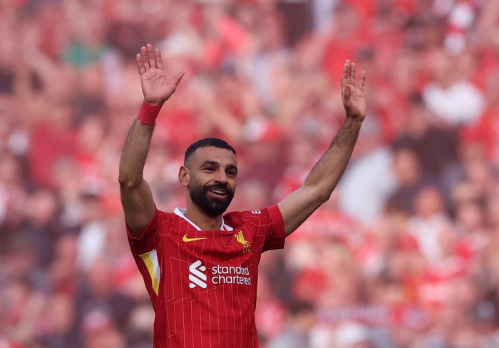 Mohamed Salah Soccer Football - Premier League - Liverpool v Tottenham Hotspur - Anfield, Liverpool, Britain - April 27, 2025 Liverpools Mohamed Salah celebrates after winning the Premier League REUTERS/Phil Noble EDITORIAL USE ONLY. NO USE WITH UNAUTHORIZED AUDIO, VIDEO, DATA, FIXTURE LISTS, CLUB/LEAGUE LOGOS OR LIVE SERVICES. ONLINE IN-MATCH USE LIMITED TO 120 IMAGES, NO VIDEO EMULATION. NO USE IN BETTING, GAMES OR SINGLE CLUB/LEAGUE/PLAYER PUBLICATIONS. PLEASE CONTACT YOUR ACCOUNT REPRESENTATIVE FOR FURTHER DETAILS..