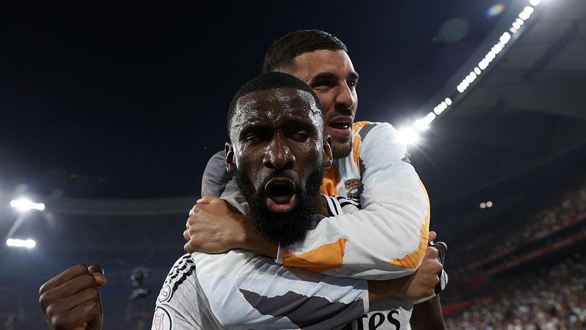 Antonio Ruediger menikmati duel dengan Erling Haaland. (Foto: Anadolu via Getty Images/Anadolu)