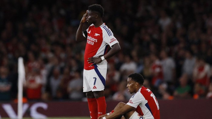 Arsenal, Bukayo Saka Soccer Football - Champions League - Semi Final - First Leg - Arsenal v Paris Saint Germain - Emirates Stadium, London, Britain - April 29, 2025 Arsenals Bukayo Saka and Jurrien Timber Action Images via Reuters/Andrew Couldridge