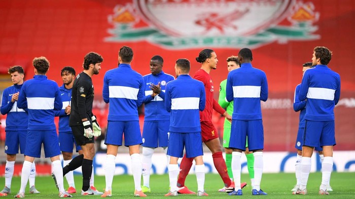 Liverpool vs Chelsea FILE PHOTO: Soccer Football - Premier League - Liverpool v Chelsea - Anfield, Liverpool, Britain - July 22, 2020 Chelsea players with the guard of honour for Liverpool before the match, as play resumes behind closed doors following the outbreak of the coronavirus disease (COVID-19) Pool via REUTERS/Laurence Griffiths EDITORIAL USE ONLY. No use with unauthorized audio, video, data, fixture lists, club/league logos or live services. Online in-match use limited to 75 images, no video emulation. No use in betting, games or single club/league/player publications. Please contact your account representative for further details./File Photo
