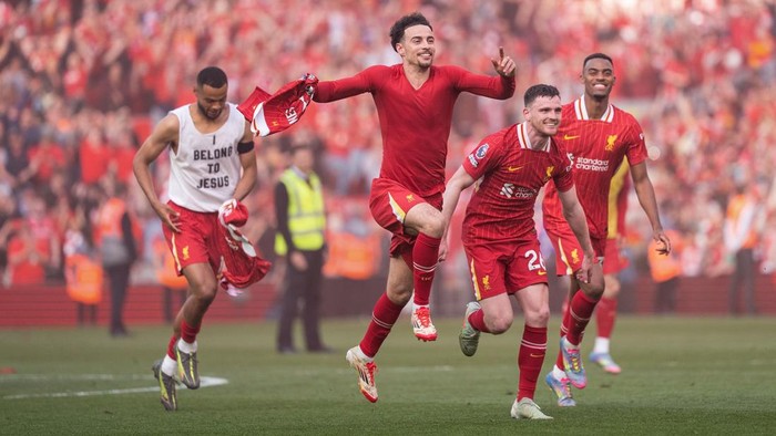 Curtis Jones leads the celebrations after the Premier League match between Liverpool and Tottenham Hotspur at Anfield in Liverpool, England, on April 27, 2025. (Photo by Steven Halliwell | MI News/NurPhoto via Getty Images)