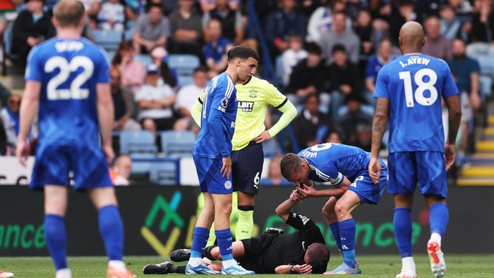 Jamie Vardy LEICESTER, ENGLAND - MAY 03: Jamie Vardy of Leicester City blows referee David Webbs whistle, who has gone down with an injury during the Premier League match between Leicester City FC and Southampton FC at The King Power Stadium on May 03, 2025 in Leicester, England. (Photo by Alex Pantling/Getty Images)