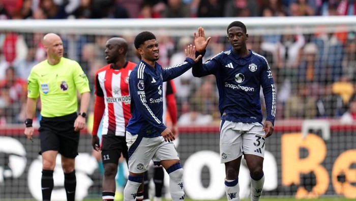 Manchester United Manchester Uniteds Amad Diallo (left) celebrates scoring their sides third goal of the game during the Premier League match at the Gtech Community Stadium, London. Picture date: Sunday May 4, 2025. (Photo by John Walton/PA Images via Getty Images)