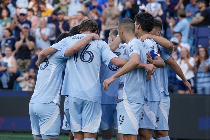 May 4, 2025; Kansas City, Kansas, USA; Sporting Kansas City forward Daniel Salloi (10) celebrates with team mates after scoring against the LA Galaxy during the first half at Childrens Mercy Park. Mandatory Credit: Denny Medley-Imagn Images