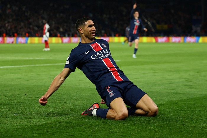 Soccer Football - Champions League - Semi Final - Second Leg - Paris St Germain v Arsenal - Parc des Princes, Paris, France - May 7, 2025 Paris St Germains Achraf Hakimi celebrates scoring their second goal REUTERS/Gonzalo Fuentes     TPX IMAGES OF THE DAY
