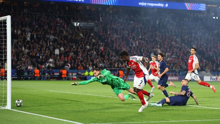 Arsenal, Bukayo Saka PARIS, FRANCE - MAY 7: Bukayo Saka of Arsenal scores a goal during the UEFA Champions League 2024/25 Semi Final Second Leg match between Paris Saint-Germain and Arsenal FC at Parc des Princes on May 7, 2025 in Paris, France. (Photo by Marc Atkins/Getty Images)