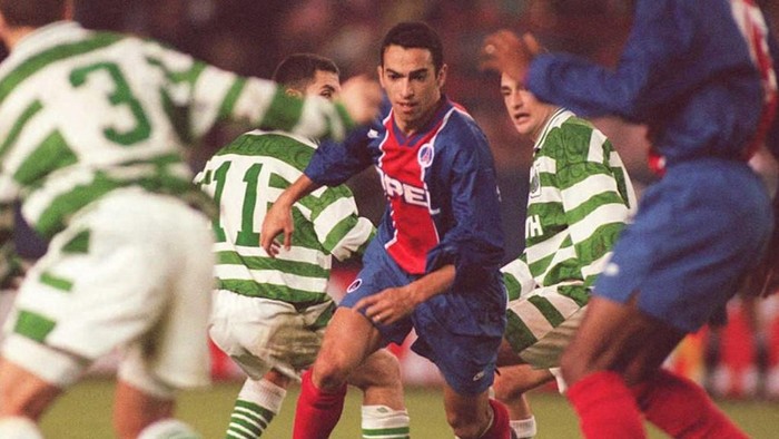 Youri Djorkaeff Paris Saint-Germain's Youri Djorkaeff (C) breaks through the Glasgow Celtic defense during their European Cup Winners Cup match in Paris 19 October. Paris Saint-Germain won 1-0 on a goal by Djorkaeff.
AFP PHOTO (Photo by VINCENT AMALVY / AFP)