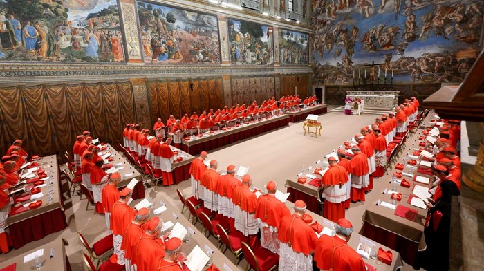 Pope Leo XIV stands in the Sistine Chapel among cardinals after being elected, at the Vatican, May 8, 2025. Vatican Media/­Francesco Sforza/Handout via REUTERS    ATTENTION EDITORS - THIS IMAGE WAS PROVIDED BY A THIRD PARTY.