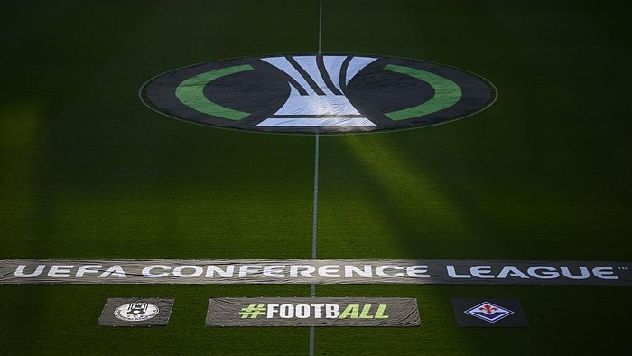 uefa conference league europa conference league logo uefa conference league logo CELJE, SLOVENIA - APRIL 10: General view inside the stadium featuring the UEFA Conference League logo on the pitch prior to the UEFA Conference League 2024/25 Quarter Final First Leg match between NK Celje and ACF Fiorentina at Stadion Celje on April 10, 2025 in Celje, Slovenia. (Photo by Jurij Kodrun - UEFA/UEFA via Getty Images)