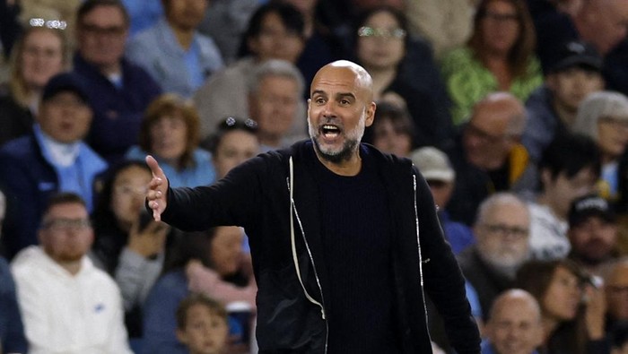 Pep Guardiola Soccer Football - Premier League - Manchester City v Wolverhampton Wanderers - Etihad Stadium, Manchester, Britain - May 2, 2025 Manchester City manager Pep Guardiola reacts Action Images via Reuters/Jason Cairnduff EDITORIAL USE ONLY. NO USE WITH UNAUTHORIZED AUDIO, VIDEO, DATA, FIXTURE LISTS, CLUB/LEAGUE LOGOS OR LIVE SERVICES. ONLINE IN-MATCH USE LIMITED TO 120 IMAGES, NO VIDEO EMULATION. NO USE IN BETTING, GAMES OR SINGLE CLUB/LEAGUE/PLAYER PUBLICATIONS. PLEASE CONTACT YOUR ACCOUNT REPRESENTATIVE FOR FURTHER DETAILS..