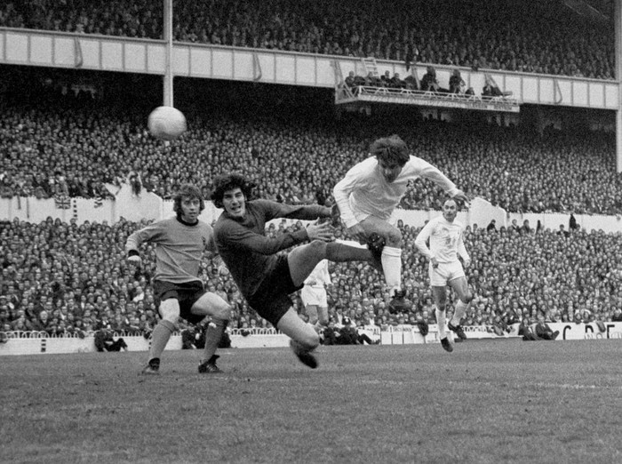 Alan Mullery flies in with a header to beat Wolves goalkeeper Phil Parkes and open the scoring with a goal for Spurs after 29 minutes of the UEFA Cup final.   (Photo by PA Images via Getty Images)