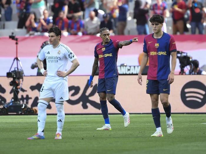 BARCELONA, SPAIN - MAY 11:  Barcelona's Brazilian forward Raphinha celebrates during la liga football match FC Barcelona vs Real Madrid at the Estadi Olimpic Lluis Companys, in Barcelona, on May 11, 2025. (Photo by Adria Puig/Anadolu via Getty Images)
