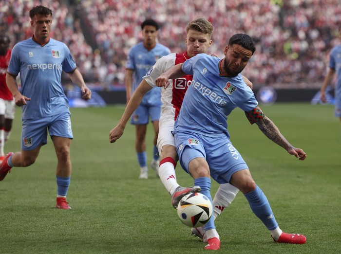 AMSTERDAM, NETHERLANDS - MAY 11: (L-R) Anton Gaaei of Ajax, Calvin Verdonk of NEC Nijmegen  during the Dutch Eredivisie  match between Ajax v NEC Nijmegen at the Johan Cruijff Arena on May 11, 2025 in Amsterdam Netherlands (Photo by Rico Brouwer/Soccrates/Getty Images)
