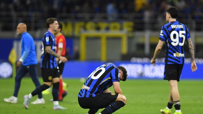 Soccer Football - Serie A - Inter Milan v Lazio - San Siro, Milan, Italy - May 18, 2025 Inter Milans Carlos Augusto reacts after the match REUTERS/Massimo Pinca