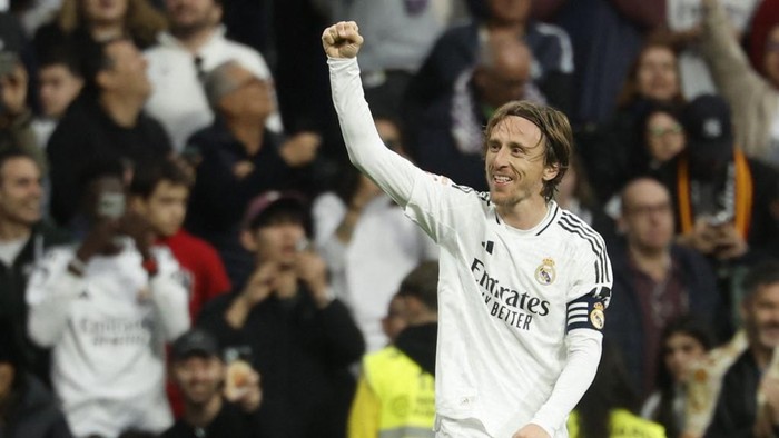 Luka Modric (FILES) Real Madrids Croatian midfielder #10 Luka Modric celebrates scoring the opening goal during the Spanish league football match between Real Madrid CF and Girona FC at Santiago Bernabeu Stadium in Madrid on February 23, 2025. Real Madrids Croatian midfielder Luka Modric said on May 22, 2025 he would leave the Spanish giants after the Club World Cup this summer. (Photo by Pierre-Philippe MARCOU / AFP)