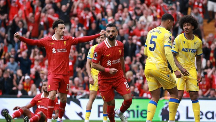 Soccer Football - Premier League - Liverpool v Crystal Palace - Anfield, Liverpool, Britain - May 25, 2025 Liverpools Mohamed Salah celebrates scoring their first goal REUTERS/Phil Noble EDITORIAL USE ONLY. NO USE WITH UNAUTHORIZED AUDIO, VIDEO, DATA, FIXTURE LISTS, CLUB/LEAGUE LOGOS OR LIVE SERVICES. ONLINE IN-MATCH USE LIMITED TO 120 IMAGES, NO VIDEO EMULATION. NO USE IN BETTING, GAMES OR SINGLE CLUB/LEAGUE/PLAYER PUBLICATIONS. PLEASE CONTACT YOUR ACCOUNT REPRESENTATIVE FOR FURTHER DETAILS..