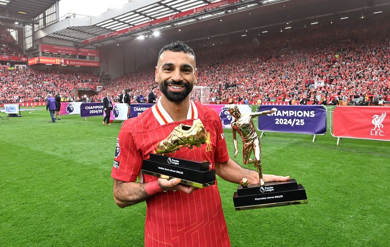 LIVERPOOL, ENGLAND - MAY 25: (THE SUN OUT. THE SUN ON SUNDAY OUT) Mohamed Salah of Liverpool poses for a photo with his Premier League Golden boot and Playmakers award after the teams 1-1 draw in the Premier League match between Liverpool FC and Crystal Palace FC at Anfield on May 25, 2025 in Liverpool, England. (Photo by Liverpool FC/Liverpool FC via Getty Images)