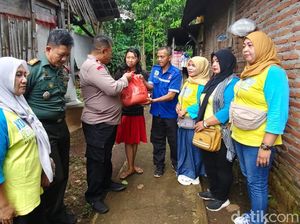 Polres Pasuruan-Komunitas Peduli Dhuafa Salurkan Bansos di Purwodadi
