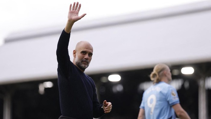 Soccer Football - Premier League - Fulham v Manchester City - Craven Cottage, London, Britain - May 25, 2025 Manchester City manager Pep Guardiola celebrates after the match Action Images via Reuters/Andrew Couldridge EDITORIAL USE ONLY. NO USE WITH UNAUTHORIZED AUDIO, VIDEO, DATA, FIXTURE LISTS, CLUB/LEAGUE LOGOS OR LIVE SERVICES. ONLINE IN-MATCH USE LIMITED TO 120 IMAGES, NO VIDEO EMULATION. NO USE IN BETTING, GAMES OR SINGLE CLUB/LEAGUE/PLAYER PUBLICATIONS. PLEASE CONTACT YOUR ACCOUNT REPRESENTATIVE FOR FURTHER DETAILS..