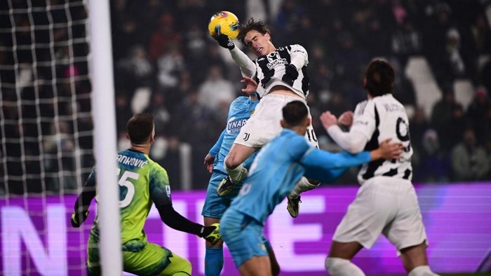 Juventus' Turkish midfielder #10 Kenan Yildiz scores a goal that was later cancelled by the Video Assistant Referee during the Italian Serie A football match between Juventus FC and Venezia FC at the Allianz Stadium in Turin, on December 14, 2024. (Photo by MARCO BERTORELLO / AFP)