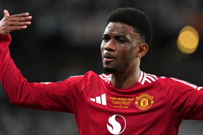 Manchester Uniteds Ivorian forward #16 Amad Diallo reacts during the UEFA Europa League final football match between Tottenham Hotspur and Manchester United at San Mames stadium in Bilbao on May 21, 2025. (Photo by CESAR MANSO / AFP) / The erroneous