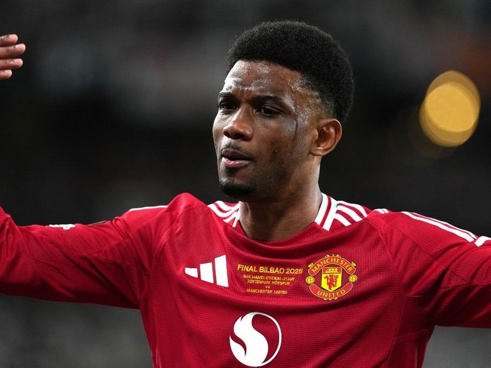 Manchester United's Ivorian forward #16 Amad Diallo reacts during the UEFA Europa League final football match between Tottenham Hotspur and Manchester United at San Mames stadium in Bilbao on May 21, 2025. (Photo by CESAR MANSO / AFP) / The erroneous mention[s] appearing in the metadata of this photo by CESAR MANSO has been modified in AFP systems in the following manner: [Manchester United's Ivorian forward #16 Amad Diallo] instead of [Manchester United's Argentinian forward #17 Alejandro Garnacho ]. Please immediately remove the erroneous mention[s] from all your online services and delete it (them) from your servers. If you have been authorized by AFP to distribute it (them) to third parties, please ensure that the same actions are carried out by them. Failure to promptly comply with these instructions will entail liability on your part for any continued or post notification usage. Therefore we thank you very much for all your attention and prompt action. We are sorry for the inconvenience this notification may cause and remain at your disposal for any further information you may require.