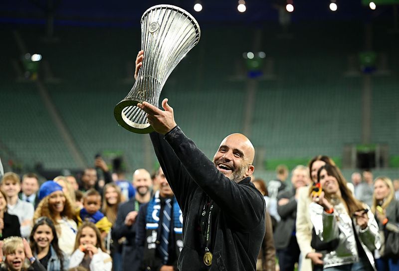 Chelsea manager Enzo Maresca lifts the trophy after winning the UEFA Conference League final match at Tarczynski Arena Wroclaw, Poland. Picture date: Wednesday May 28, 2025. (Photo by Rafal Oleksiewicz/PA Images via Getty Images)