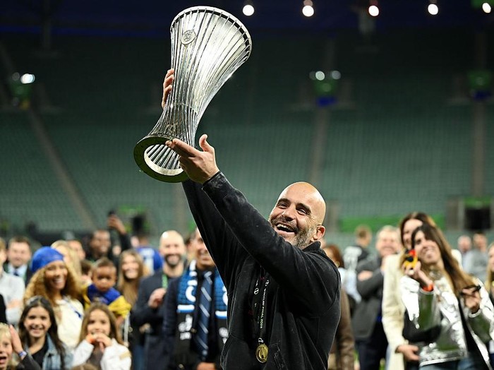 Chelsea manager Enzo Maresca lifts the trophy after winning the UEFA Conference League final match at Tarczynski Arena Wroclaw, Poland. Picture date: Wednesday May 28, 2025. (Photo by Rafal Oleksiewicz/PA Images via Getty Images)