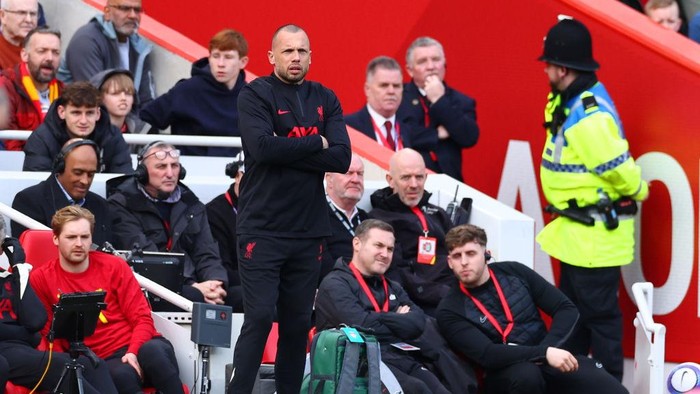 LIVERPOOL, ENGLAND - MARCH 08: Liverpool coach John Heitinga looks on during the Premier League match between Liverpool FC and Southampton FC at Anfield on March 08, 2025 in Liverpool, England. (Photo by Chris Brunskill/Fantasista/Getty Images)