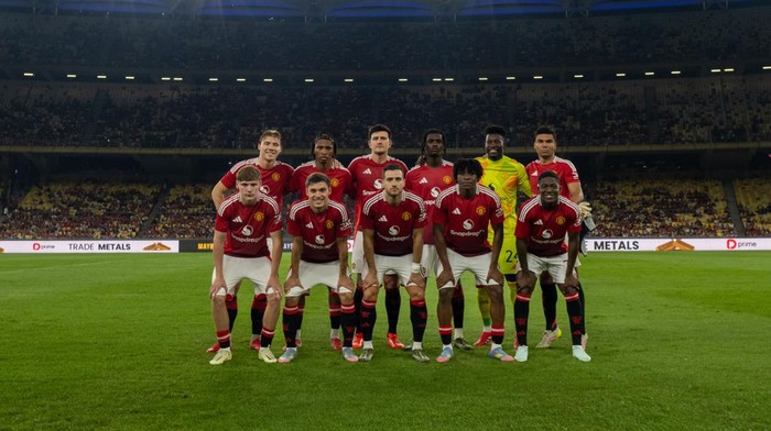 KUALA LUMPUR, MALAYSIA - MAY 28: The Manchester United team (Back Row L-R Rasmus Hojlund, Reece Munro, Harry Maguire, Ayden Heaven, Andre Onana, Casemiro. Front Row L-R: Jack Moorhouse, Manuel Ugarte, Diogo Dalot, Patrick Chinazaekpere Dorgu, Kobbie Mainoo) lines up ahead of the match between Manchester United and ASEAN All Stars at Bukit Jalil National Stadium on May 28, 2025 in Kuala Lumpur, Malaysia.  (Photo by Ash Donelon/Manchester United via Getty Images)