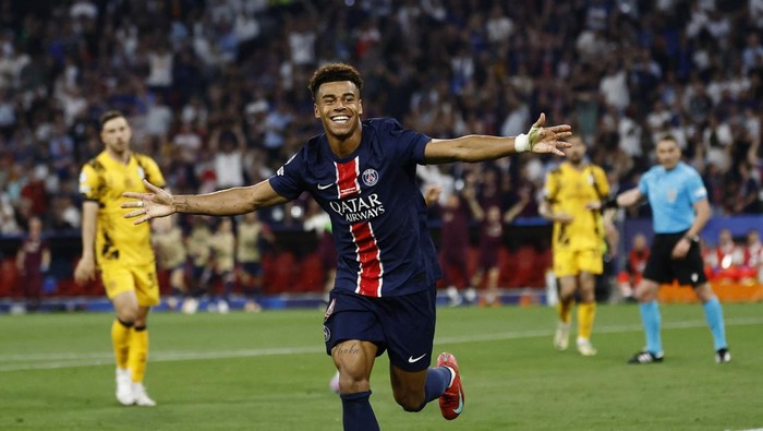 Soccer Football - Champions League - Final - Paris St Germain v Inter Milan - Allianz Arena, Munich, Germany - May 31, 2025 Paris St Germains Desire Doue celebrates scoring their third goal REUTERS/Stephanie Lecocq