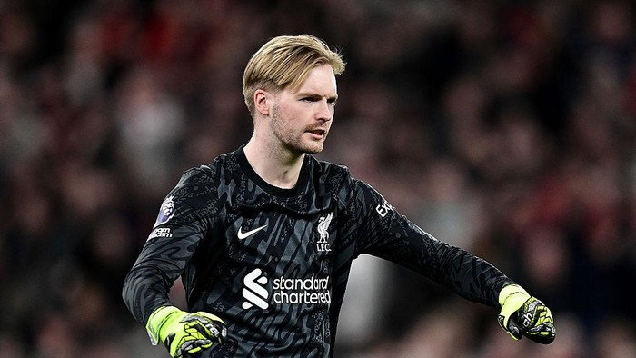 LIVERPOOL, ENGLAND - APRIL 2:   Liverpools Caoimhin Kelleher celebrates at the end of the Premier League match between Liverpool FC and Everton FC at Anfield on April 2, 2025 in Liverpool, England. (Photo by Richard Martin-Roberts - CameraSport/CameraSport via Getty Images)