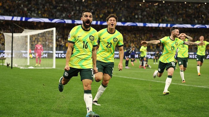 Aziz Behich PERTH, AUSTRALIA - JUNE 05: Aziz Behich of the Socceroos celebrates scoring a goal during the 2026 FIFA World Cup Round Three AFC Asian Qualifier match between Australia Socceroos and Japan at Optus Stadium on June 05, 2025 in Perth, Australia. (Photo by Robert Cianflone/Getty Images)