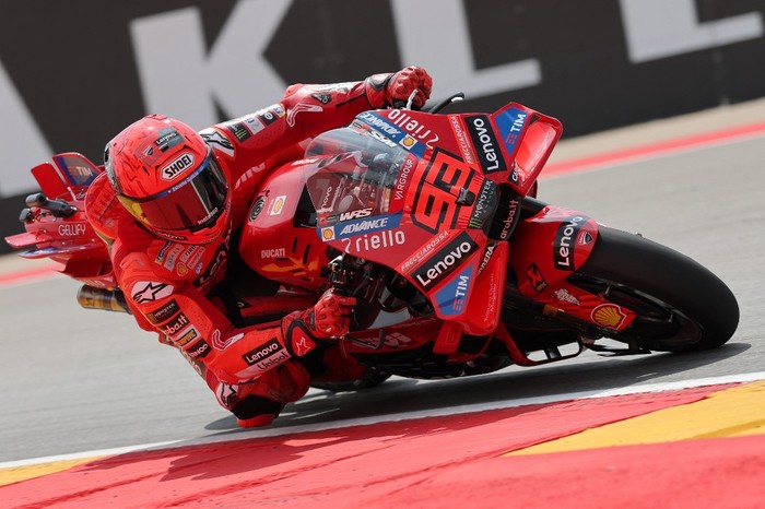MOTO-PRIX-ESP-ARAGON Ducati Lenovo Teams Spanish rider Marc Marquez takes a curve during the second free practice on June 6, 2025, ahead of the MotoGP Aragon Grand Prix at the Motorland circuit in Alcaniz, northeastern Spain. (Photo by LLUIS GENE / AFP)