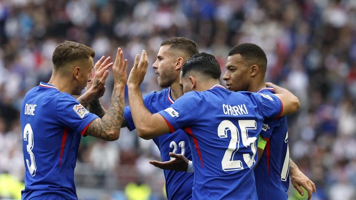 Soccer Football - Nations League - Third Place Play Off Match - Germany v France - MHPArena, Stuttgart, Germany - June 8, 2025 Frances Kylian Mbappe celebrates scoring their first goal with Rayan Cherki, Lucas Digne and Lucas Hern