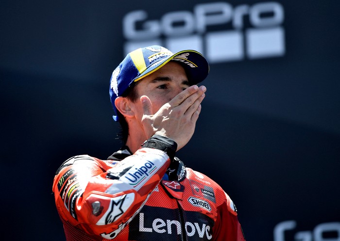 Marc Marquez MotoGP - Aragon Grand Prix - Ciudad del Motor de Aragon, Alcaniz, Spain - June 8, 2025 Ducati Lenovo Teams Marc Marquez celebrates on the podium after winning the Aragon Grand Prix REUTERS/Pablo Morano